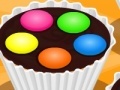                                                                     Muffins smarties on the top ﺔﺒﻌﻟ